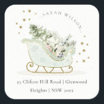 Aqua Blue Gold Winter Sleigh Christmas Address Square Sticker<br><div class="desc">Chill Out Sleigh Winter Theme Collection.- it's a cute pastel watercolor Illustration of Aqua blue gold sleigh filled with Christmas pine tree, gifts and winter berries with classy gold star frame and snowfall in the background. Perfect for your little ones winter birthday party. It’s very easy to customize, with your...</div>