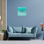 Aquamarine green turquoise square wall clock<br><div class="desc">Abstract pattern of aquamarine,  turquoise colored sea water with soft and pale green and bit of  blue. Clock face with white letters.
Photo of the Mediterranean Ocean.</div>