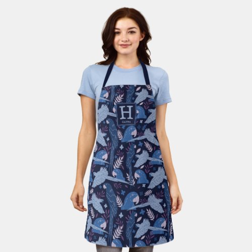 Ara Parrot Blue Tropical Leaf Pattern Monogram Apron - Ara Parrot Blue Tropical Leaf Pattern Monogram Apron. Blue ara parrots in a pattern on dark blue background with tropical leaves. Add your name and monogram.