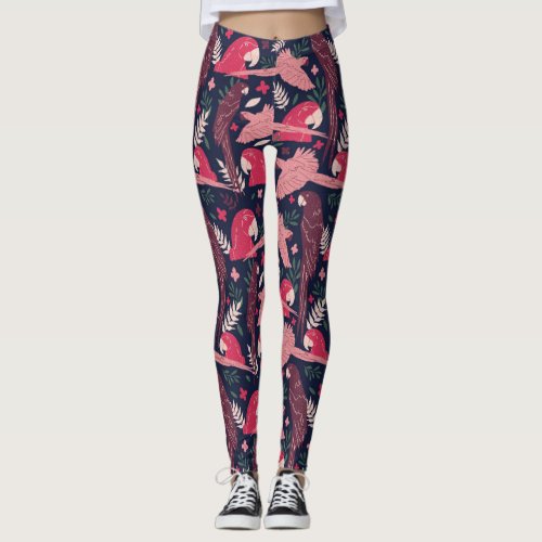 Ara Parrot Red Pink Drawing Tropical Leave Pattern Leggings - Ara Parrot Red Pink Drawing Tropical Leave Pattern Leggings. Ara pattern on dark blue background with tropical leaves in green, red and beige colors. Digital hand-drawn illustration.