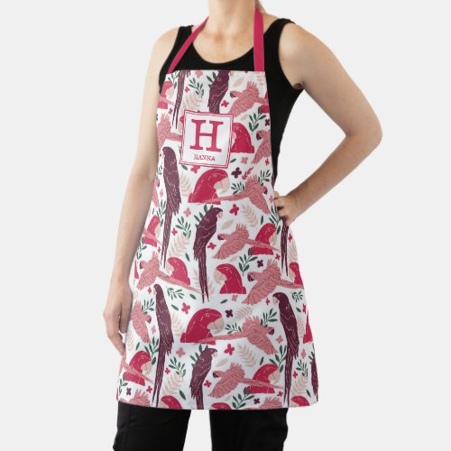 Ara Parrot Red Tropical Leaf Pattern Monogram Apron - Ara Parrot Red Tropical Leaf Pattern Monogram Apron. Red and burgundy ara parrots in a pattern on white background with tropical leaves. Add your name or erase it.