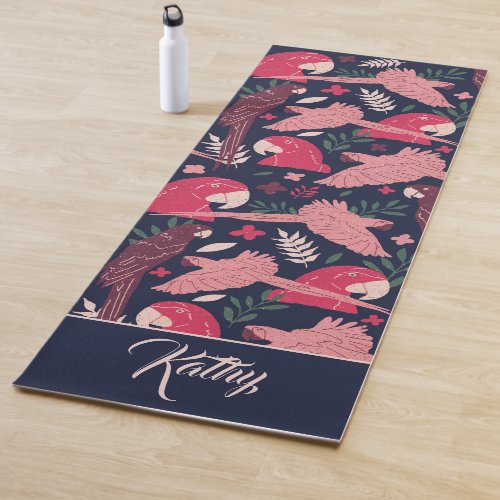 Ara Parrot Tropical Pattern Drawing Monogram Name Yoga Mat - Ara Parrot Tropical Pattern Drawing Monogram Name Yoga Mat. Ara pattern on dark blue background with tropical leaves in green, red and beige colors with a name in pink script. Great for parrot lovers and parrot owners. Add your name or monogram.