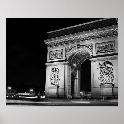 Arc de Triomphe at night in Paris Poster