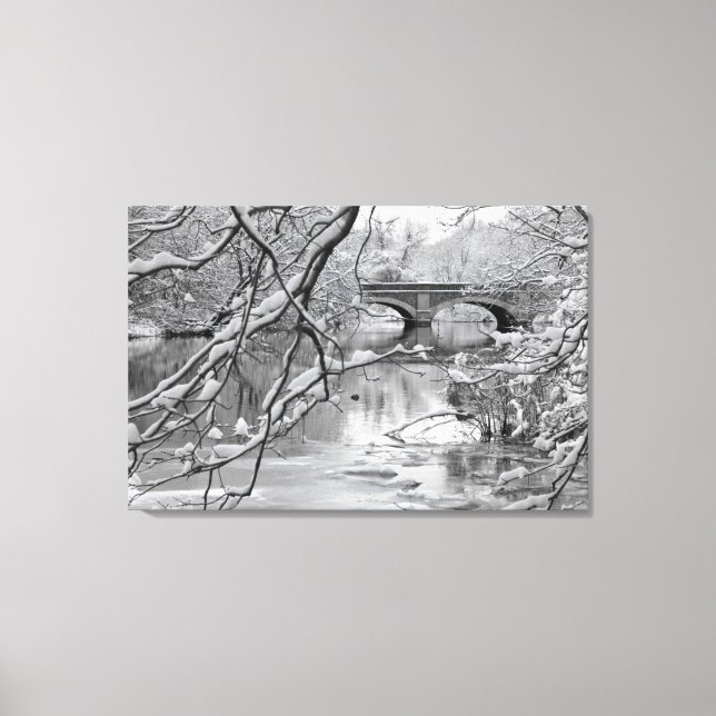 Arch Bridge over Frozen River in Winter Canvas Print (Front)