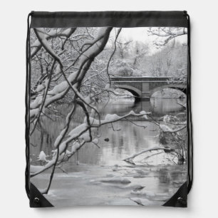Arch Bridge over Frozen River in Winter Drawstring Bag