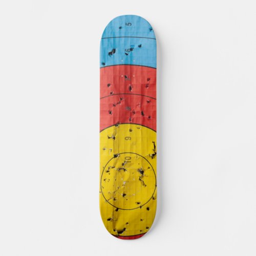 Archery target close up with many arrow holes skateboard deck