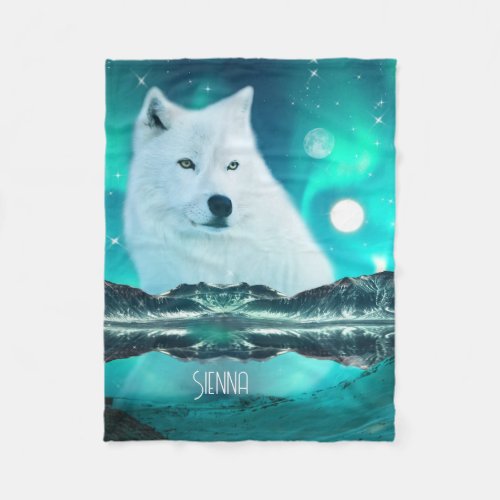 Arctic wolf and magical night with northern lights fleece blanket