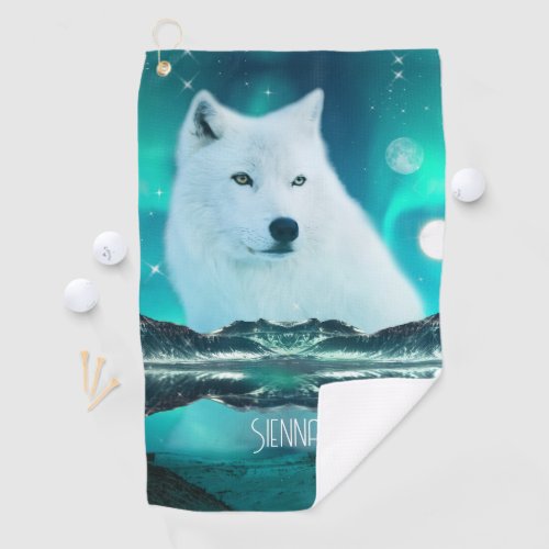 Arctic wolf and magical night with northern lights golf towel