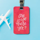 Are we there yet fun cute pink handlettered luggage tag<br><div class="desc">Pick a luggage tag with some pop! This bright, colorful and fun hand-lettering design reads "are we there yet" on a pink background and has a spot on the back for name and contact info. This design was created by Lea Delaveris Design for And So Much More and makes a...</div>
