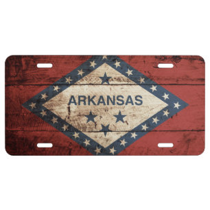 Arkansas State Flag on Old Wood Grain License Plate