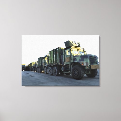 Armored trucks sit on the pier at Morehead City Canvas Print