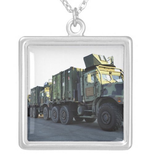 Armored trucks sit on the pier at Morehead City Silver Plated Necklace