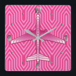 Art Deco Airplane, Fuchsia and Pastel Pink Square Wall Clock<br><div class="desc">Clock in an Art Deco inspired concept of a futuristic plane,  in a striped,  silky gradient of deep fuchsia to pastel pink,  on a deep fuchsia pink,  Deco background</div>