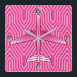 Art Deco Airplane, Fuchsia and Pastel Pink Square Wall Clock<br><div class="desc">Clock in an Art Deco inspired concept of a futuristic plane,  in a striped,  silky gradient of deep fuchsia to pastel pink,  on a deep fuchsia pink,  Deco background</div>