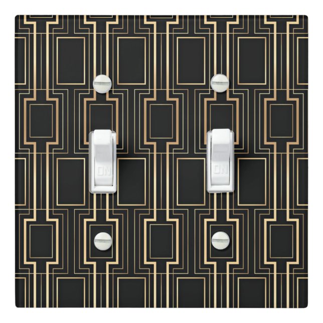 Art deco black and gold light switch cover (In Situ)