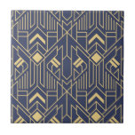 Art Deco Blue Gold Geometric Ceramic Tile<br><div class="desc">This art deco design features a geometric pattern in blue and gold.
 #artdeco #art #deco #pattern #geometric #geometrical #pattern #design #vintage #retro #blue #gold #custom #editable #style #stylish #trendy #trending #popular #bestseller #designer #home #decor #homedecor #decorative #tiles #homeaccents #gifts #elegant #unique #golden #simple</div>