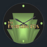 Art Deco Green Large Clock<br><div class="desc">10.75” round black acrylic wall clock with an image of a glowing green Art Deco-style decorative element on black and "The Roaring 20s" in gleaming gold lettering. Glowing green orbs mark the 12, 3 and 9 positions. See the entire Roaring 20s Clock collection in the DECOR | Clocks section.</div>