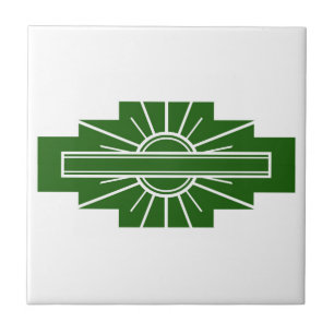 Art deco sun element in dark green ceramic tile