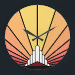 Art deco sun in dawn Wall Clock<br><div class="desc">A classic art deco style sun pattern in dawn colors.
An iconic pattern of the sun rising from behind a stylized art deco shaped building. A simple yet elegant design, true to the era.</div>