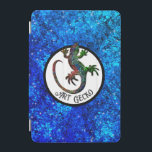Art Gecko  iPad Mini Cover<br><div class="desc">Art Gecko
This phone case is decorated with a beautiful sparkling multicolor gecko silhouette in a circle. The background is a glitter blue pattern reminding water.
The funny text saying “Art Gecko” is a reference to “Art Deco”,  you can customize it as you want.</div>