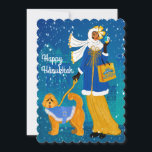 Art Nouveau Lady with Doodle Dog Holiday Card<br><div class="desc">A stylish woman walking her Doodle dog through the city while the snow starts to fall. Both are dressed in cozy coats. She carries a Hanukkah shopping bag on her arm and a Dreidle in her hand. An Art Deco city slumbers in the background.</div>