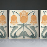 Art Nouveau Yellow/Orange Tulips Home Wall Decor Ceramic Tile<br><div class="desc">Bring a touch of timeless elegance to your home with this exquisite Art Nouveau-style ceramic tile, featuring symmetrical tulips from 1904. The graceful design and intricate details of the tulips embody the spirit of the Art Nouveau movement, making it a stunning addition to any living space. This versatile ceramic tile...</div>