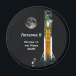 Artemis II Moon Mission Magnet<br><div class="desc">This Artemis II mission marks to return of humankind to the vicinity of the Moon after a lapse of over 50 years. This 10 day mission will carry four astronauts on a free-return trajectory around the Moon and back to Earth. The spacecraft consists of the NASA SLS Space Launch System...</div>