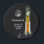 Artemis II Moon Mission Magnet<br><div class="desc">This Artemis II mission marks to return of humankind to the vicinity of the Moon after a lapse of over 50 years. This 10 day mission will carry four astronauts on a free-return trajectory around the Moon and back to Earth. The spacecraft consists of the NASA SLS Space Launch System...</div>
