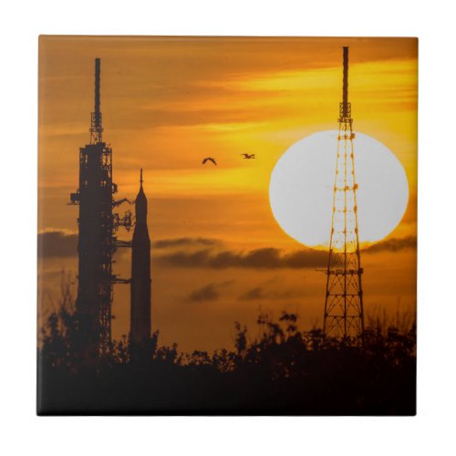 Artemis Moon Rocket at Dawn Ceramic Tile