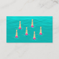 Artistic Swimmers Swimming Under Water