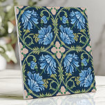 Arts and Crafts Blue Chrysanthemum Ceramic Tile<br><div class="desc">Enhance your space with this exquisite Arts and Crafts-inspired tile featuring lush blue chrysanthemums surrounded by intricate green vines and soft ivory accents on a deep indigo background. The symmetrical floral patterns exude timeless elegance, making it perfect for use as a backsplash, in bathrooms, or as an accent tile. With...</div>