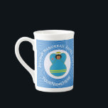 Aruba Angel Flag Hanukkah  Bone China Mug<br><div class="desc">Personalize this design of a black haired angel wearing the Aruban Flag of blue, yellow and red. Designed to decorate your home at Hanukkah. Our angel flies in a white circle of squiggly squares on a background of blue squiggly squares. Add a name below and change the year above for...</div>