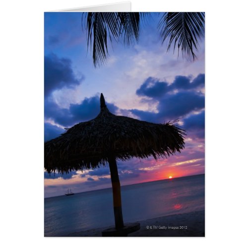 Aruba silhouette of palapa on beach at sunset 2