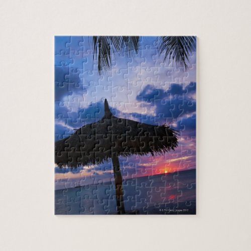 Aruba silhouette of palapa on beach at sunset 2 jigsaw puzzle