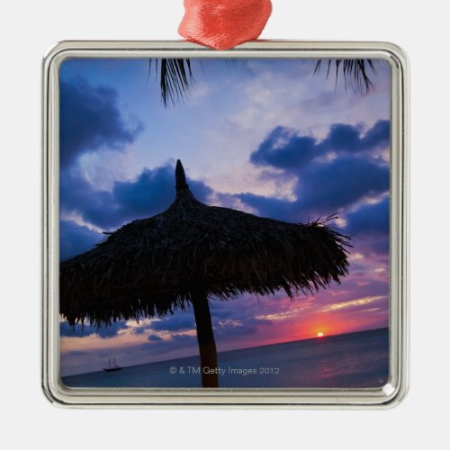 Aruba silhouette of palapa on beach at sunset 2 metal ornament