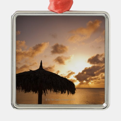 Aruba silhouette of palapa on beach at sunset metal ornament