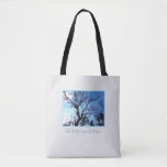 As the tree spirit sleeps tote bag<br><div class="desc">This As the tree spirit sleeps Tote Bag features the branches of a twisted old tree silhouetted against a chilly blue sky, and says "As the tree spirit sleeps... " The light textured background adds to the seasonal mood. Offered in Medium (shown) and Large, the bag is perfect for your...</div>