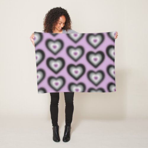 Asexual flag colors on a blurred heart fleece blanket