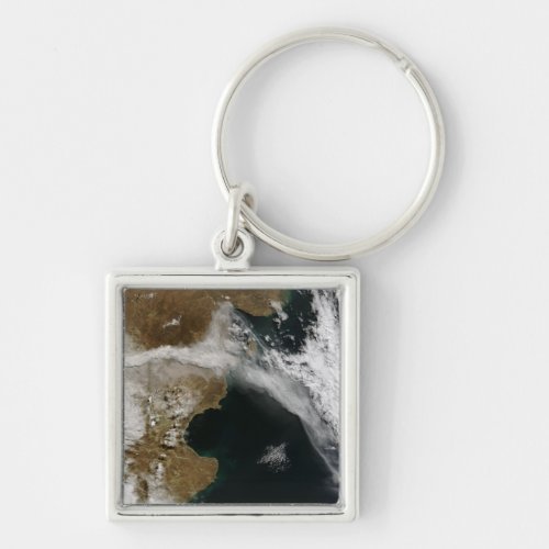 Ash plume from eruption of Chaiten volcano Chi Keychain