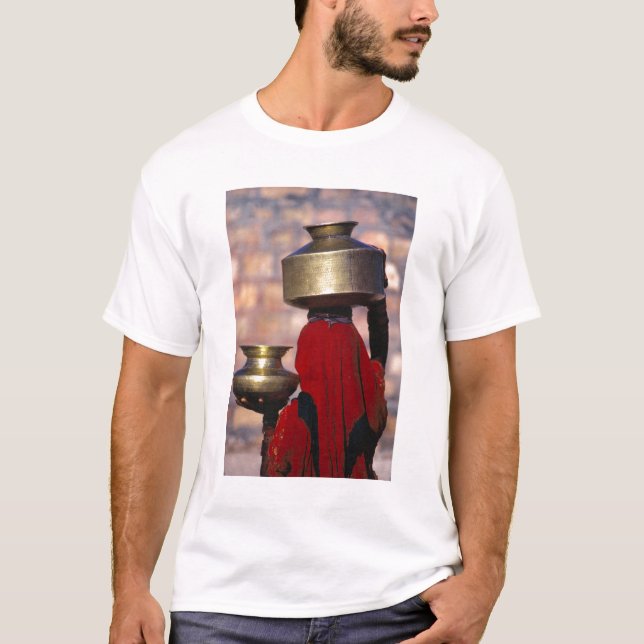 Asia, India, Rajasthan. A local woman in a red T-Shirt (Front)