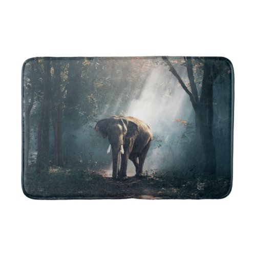 Asian Elephant in a Sunlit Forest Clearing Bathroom Mat