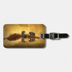 Asian Elephants in Thailand under a glowing sunset Luggage Tag