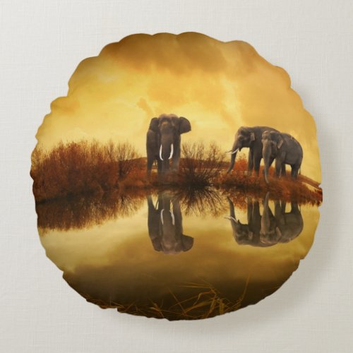 Asian Elephants in Thailand under a glowing sunset Round Pillow