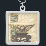 Asian Tapestry with Bowl and Dragon Design Silver Plated Necklace<br><div class="desc">A Vision Studios creation,  this decorative Asian tapestry style painting features a lovely bowl with a great dragon design. The bowl is set against a cream background with floral print. Give this as a gift,  or purchase it for yourself!</div>
