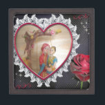 Asian Wedding Couple on Heart Swing Art Print/ Gift Box<br><div class="desc">South Asian Wedding Couple on Heart Swing Art Print/Graphic Celebrate love and tradition with our South Asian Wedding Couple on Heart Swing Art Print. This enchanting design features a just-married couple seated on a swing inside a heart, beautifully framed by a delicate white lace border. The striking black background highlights...</div>