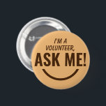 Ask Me Camel Volunteer Badge Pinback Button<br><div class="desc">Ask Me Personalized Camel beige Volunteer Badge Pinback button featuring bold and eyecatching typography text looking as an smiling emoji. Smile, help, Volunteer, Volunteers gifts, cute, vibrant, bold, bright, childish, kids, helping each others, asking for help disaster, relief, volunteer, support, mission, aid, help, courage, selfless, humanitarian, community, teamwork, solidarity, compassion,...</div>