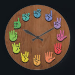 ASL Woodgrain Large Clock<br><div class="desc">ASL sign language hands clock,  with hands in color wheel colors,  on a woodgrain faux finish background.</div>