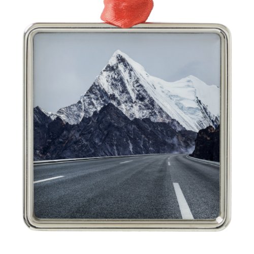 Asphalt Road in front of Snow Mountain Metal Ornament