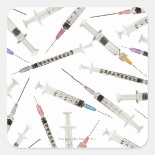 Assortment of syringes in various sizes and square sticker