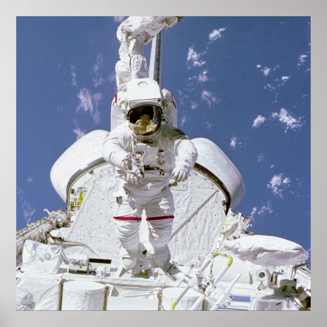 Astronaut attached to Remote Manipulator System Poster (Front)